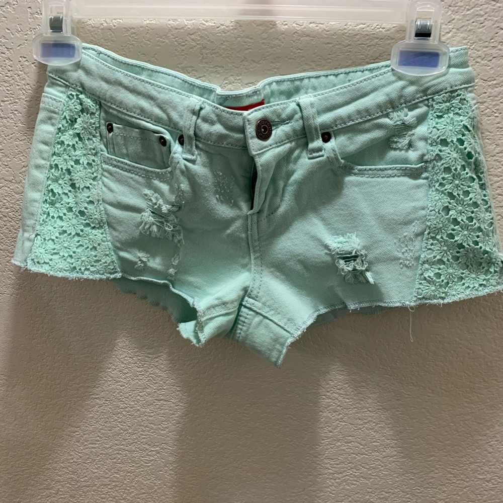 Mint green ripped/ distressed jean short. Bongo 7